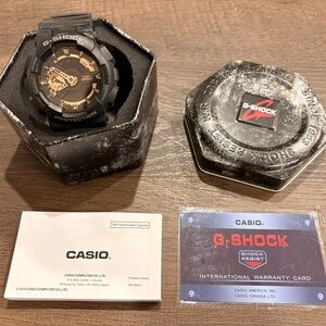 Casio G-SHOCK Black and Gold Digital-Analog Resin Watch with Tin